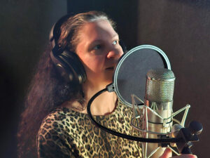 singer recording through high end studio gear
